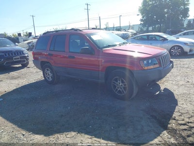 1J4GW48S44C****** · 2004 JEEP GRAND CHEROKEE LAREDO