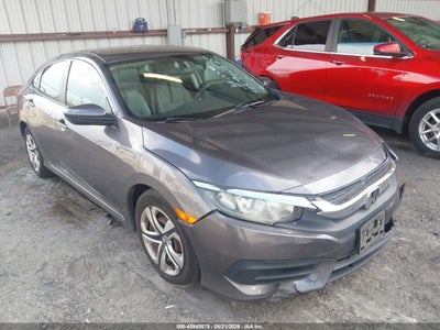 2HGFC2F59JH****** · 2018 HONDA CIVIC LX