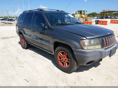 1J4GW48S44C****** · 2004 JEEP GRAND CHEROKEE LAREDO