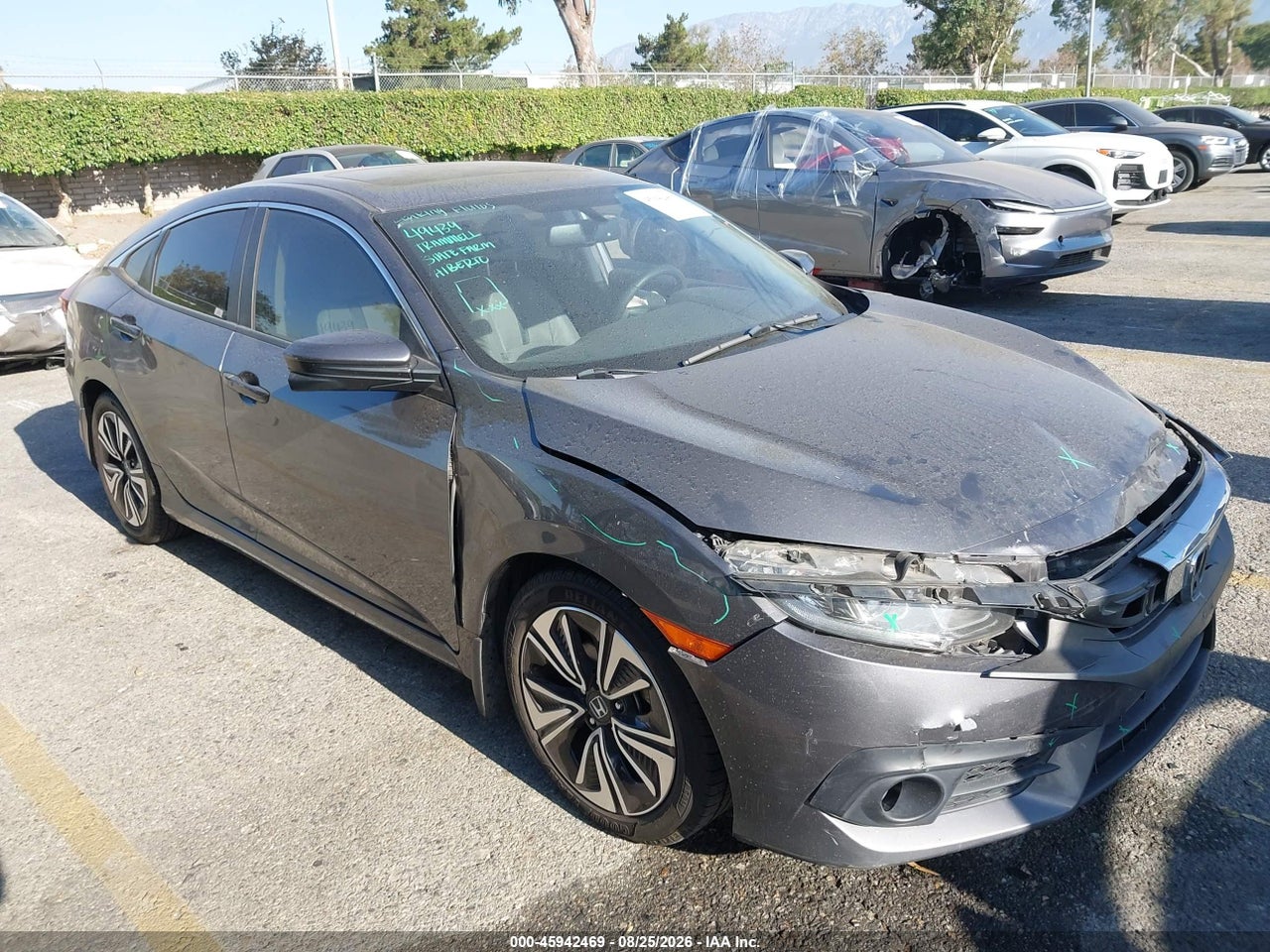 JHMFC1F73JX****** · 2018 HONDA CIVIC EX-L