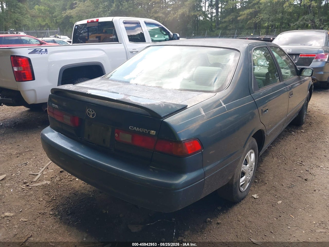 1997 TOYOTA CAMRY LE · 4/11