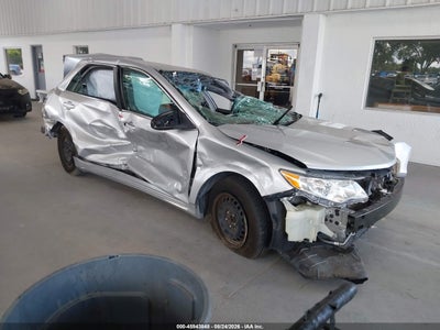 4T1BF1FK4EU****** · 2014 TOYOTA CAMRY LE