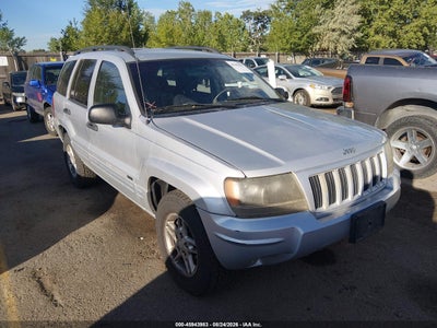 1J4GW48N14C****** · 2004 JEEP GRAND CHEROKEE LAREDO