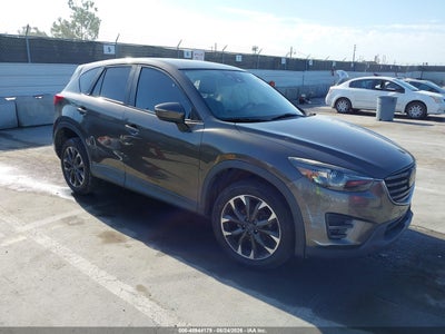JM3KE2DY2G0****** · 2016 MAZDA CX-5 GRAND TOURING