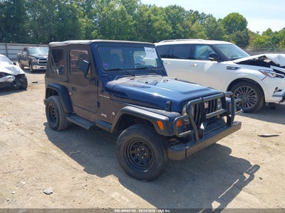 1J4FY29P1VP****** · 1997 JEEP WRANGLER SE