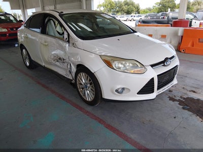 1FAHP3H23CL****** · 2012 FORD FOCUS SEL