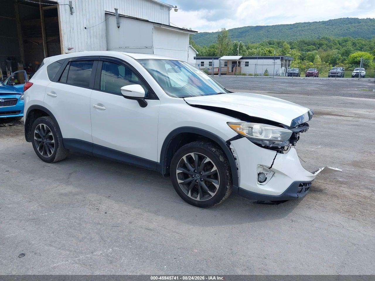 JM3KE4DY4G0****** · 2016 MAZDA CX-5 GRAND TOURING