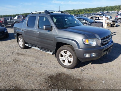 5FPYK1F55BB****** · 2011 HONDA RIDGELINE RTL