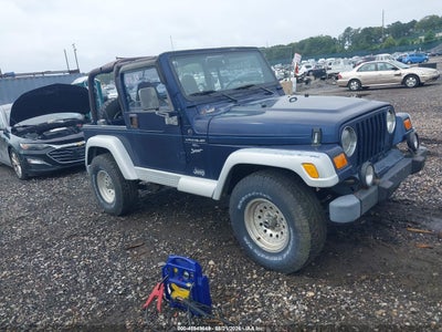 1J4FA49S0YP****** · 2000 JEEP WRANGLER SPORT