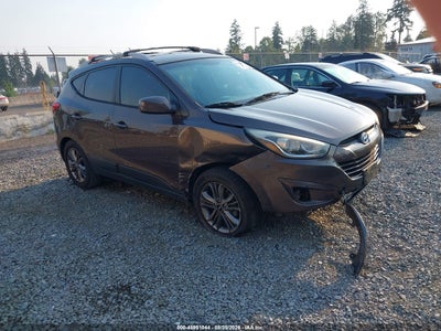 KM8JU3AG9EU****** · 2014 HYUNDAI TUCSON SE