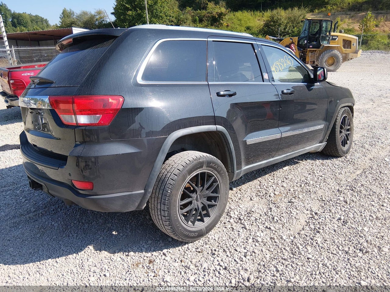 2011 JEEP GRAND CHEROKEE LAREDO · 4/11