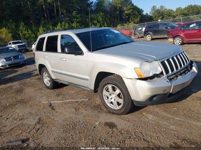 1J8GS48K59C****** · 2009 JEEP GRAND CHEROKEE LAREDO