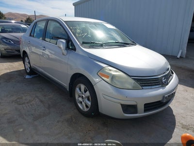 3N1BC11E79L****** · 2009 NISSAN VERSA 1.8SL