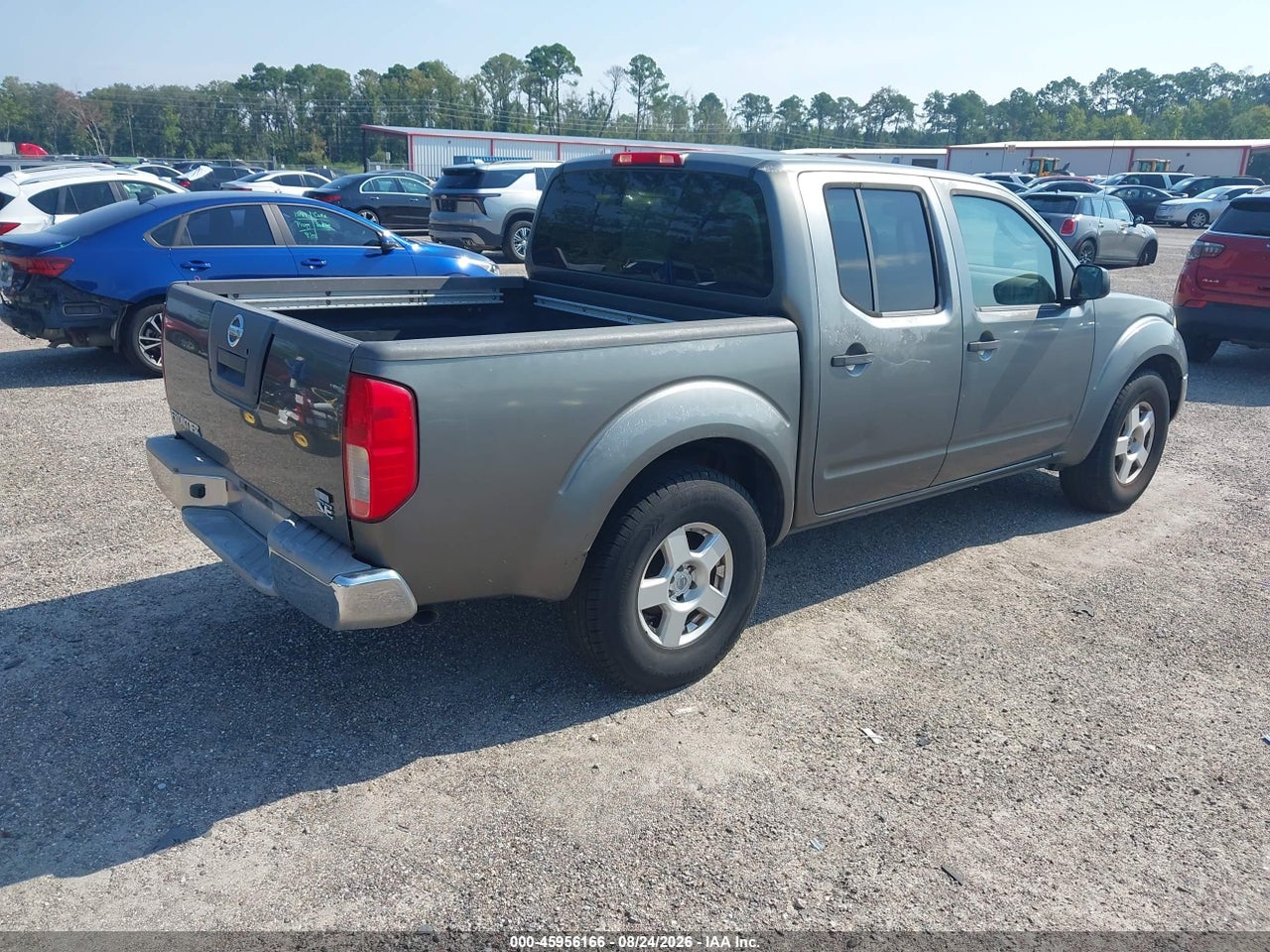 2006 NISSAN FRONTIER SE · 4/11