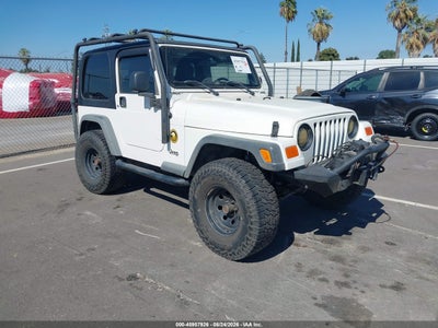 1J4FA49S36P****** · 2006 JEEP WRANGLER SPORT