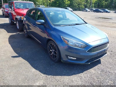 1FADP3M29JL****** · 2018 FORD FOCUS SEL