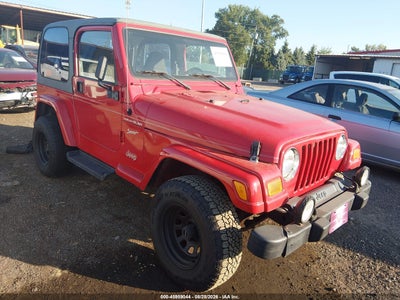 1J4FA49S62P****** · 2002 JEEP WRANGLER SPORT