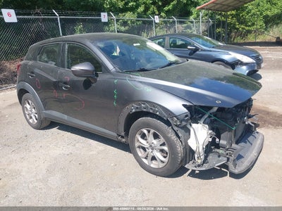 JM1DKFC73G0****** · 2016 MAZDA CX-3 TOURING