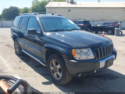 1J4GX48J44C****** · 2004 JEEP GRAND CHEROKEE LAREDO