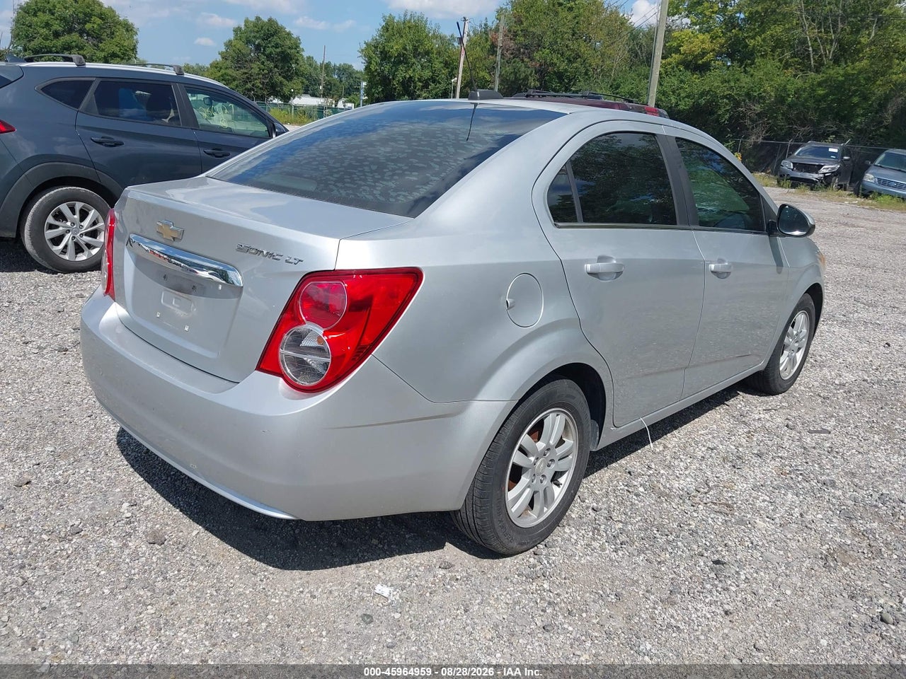 2015 CHEVROLET SONIC LT AUTO · 4/11