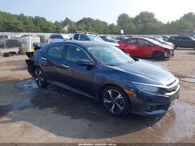 JHMFC1F93JX****** · 2018 HONDA CIVIC TOURING