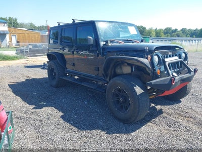 1J4BA6H10BL****** · 2011 JEEP WRANGLER UNLIMITED RUBICON