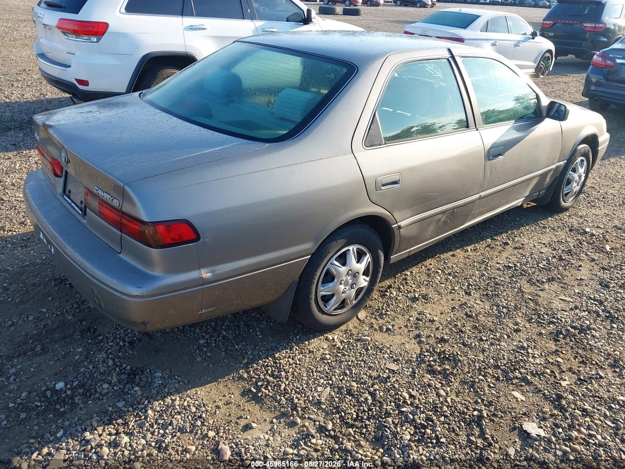1999 TOYOTA CAMRY LE · 4/11