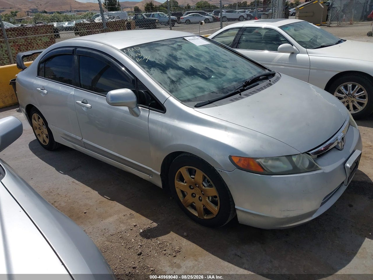 1HGFA16536L****** · 2006 HONDA CIVIC LX