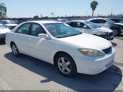 4T1BE32KX2U****** · 2002 TOYOTA CAMRY LE