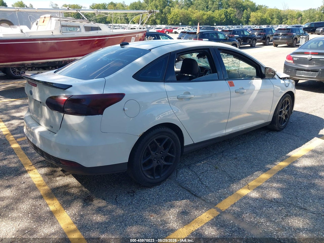 2016 FORD FOCUS SE · 4/11