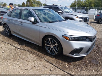 2HGFE1F90RH****** · 2024 HONDA CIVIC TOURING
