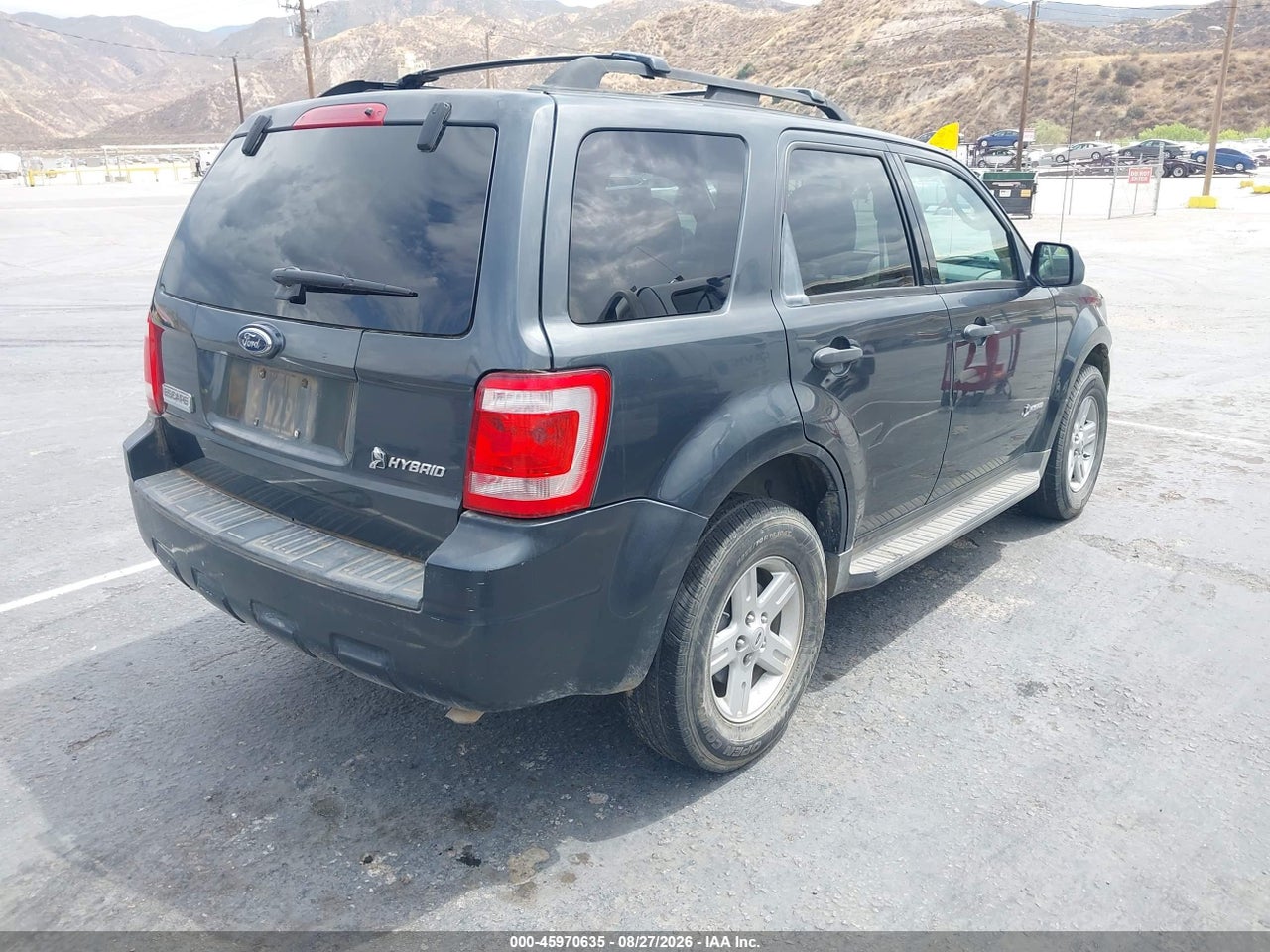 2009 FORD ESCAPE HYBRID   · 4/11