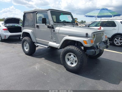 1J4FA49S11P****** · 2001 JEEP WRANGLER SPORT