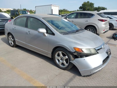1HGFA16536L****** · 2006 HONDA CIVIC LX