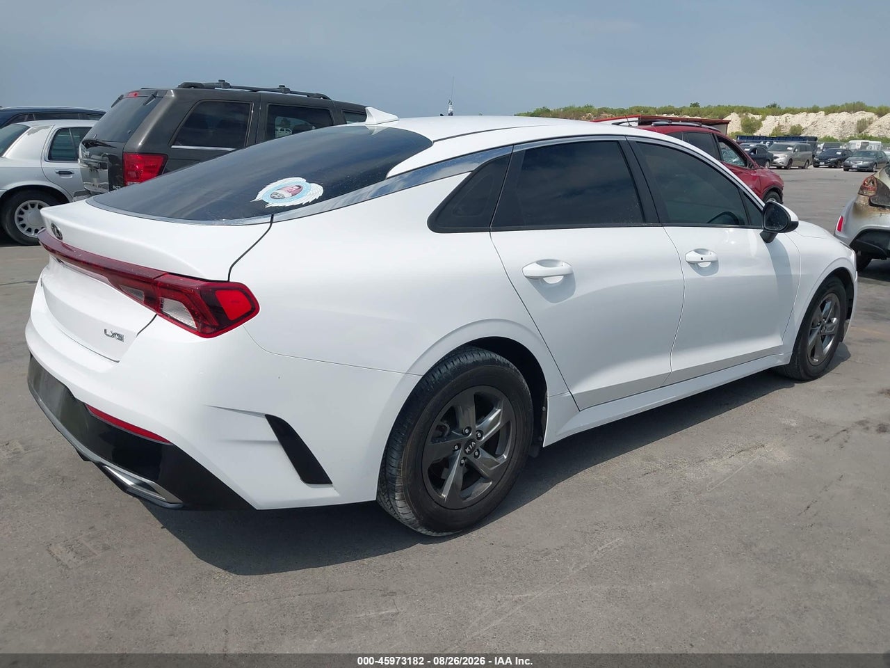 2021 KIA K5 LXS · 4/10
