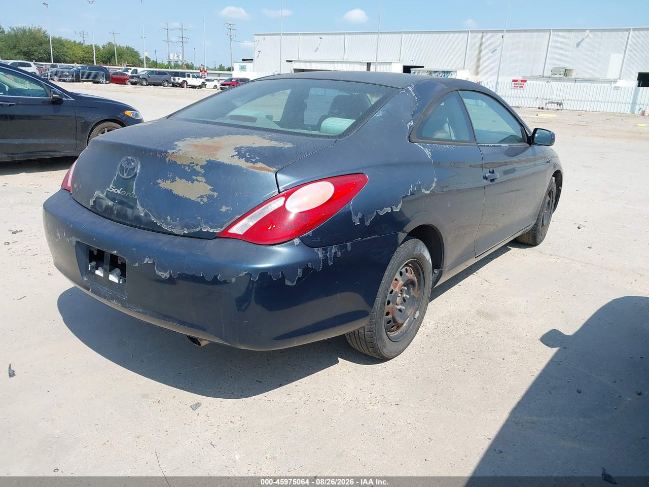 2004 TOYOTA CAMRY SOLARA SE · 4/11