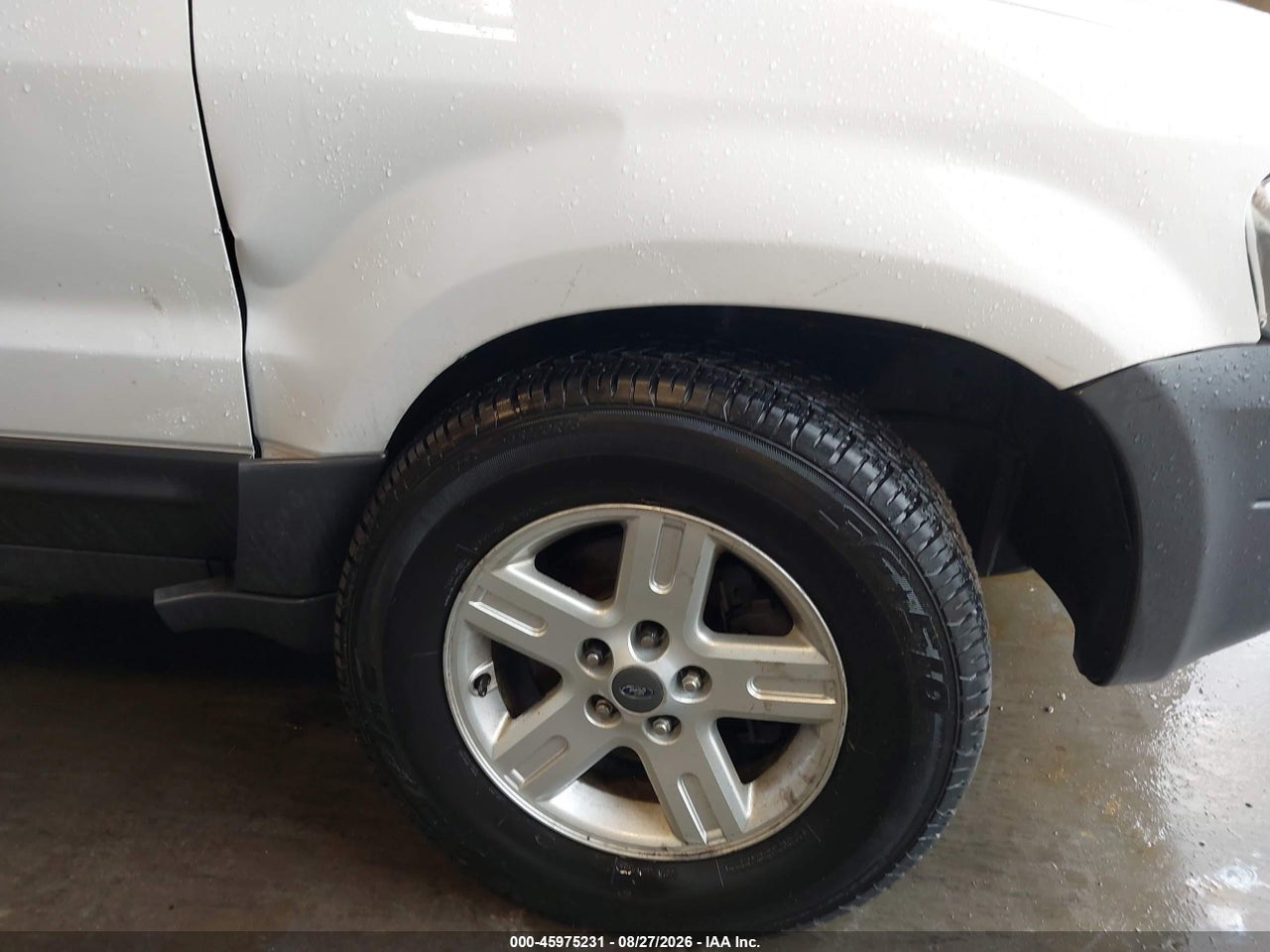 2006 FORD ESCAPE HYBRID   · 6/11
