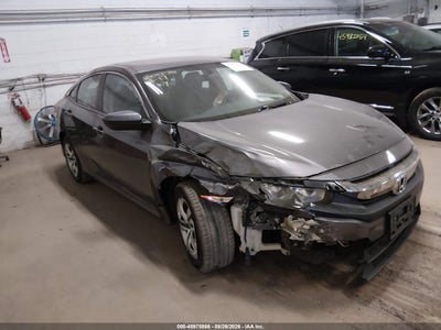 19XFC2F53JE****** · 2018 HONDA CIVIC LX
