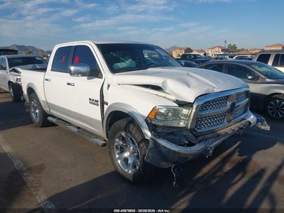 1C6RR6NT3ES****** · 2014 RAM 1500 LARAMIE