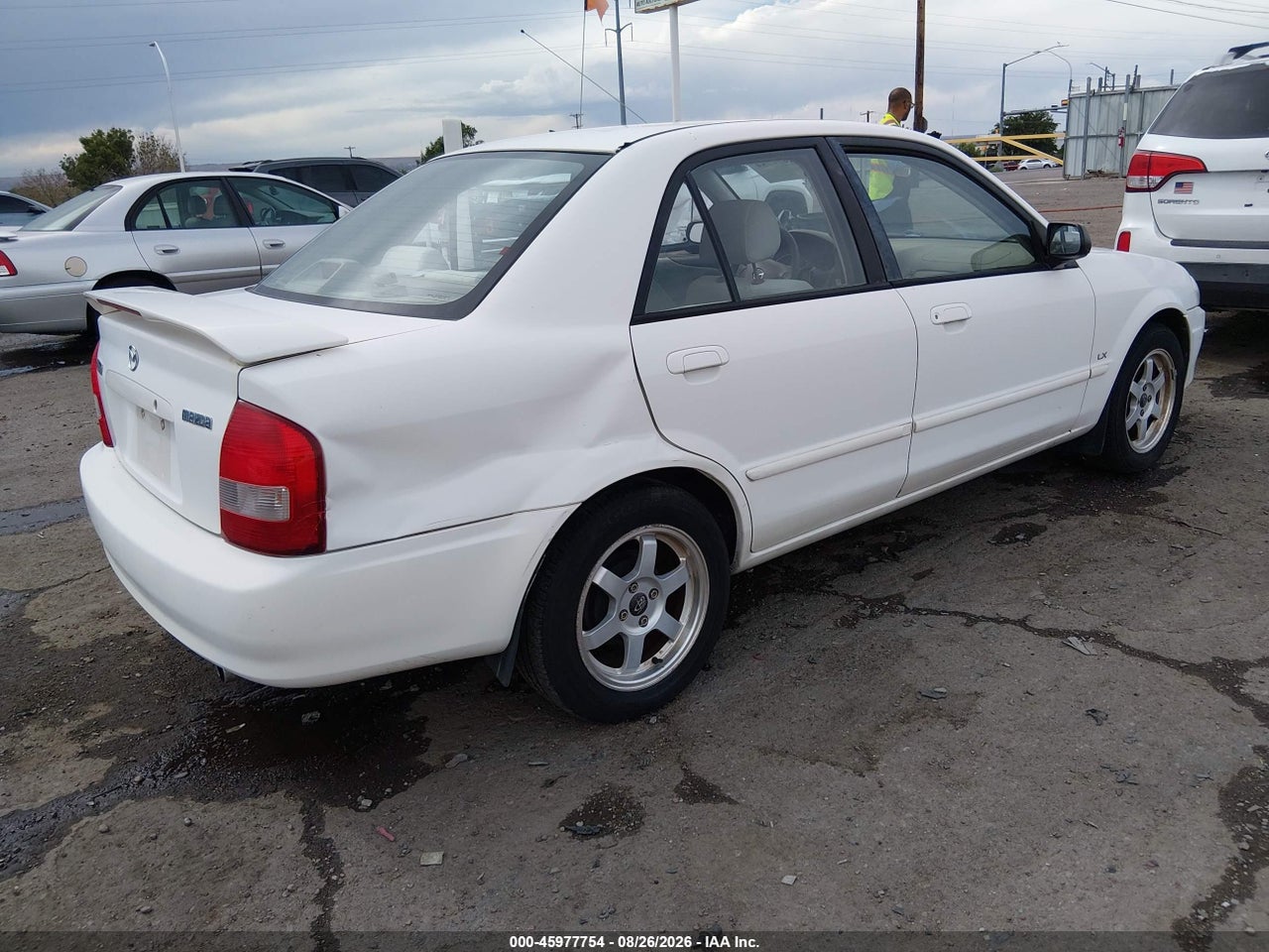 2000 MAZDA PROTEGE DX/LX · 4/11