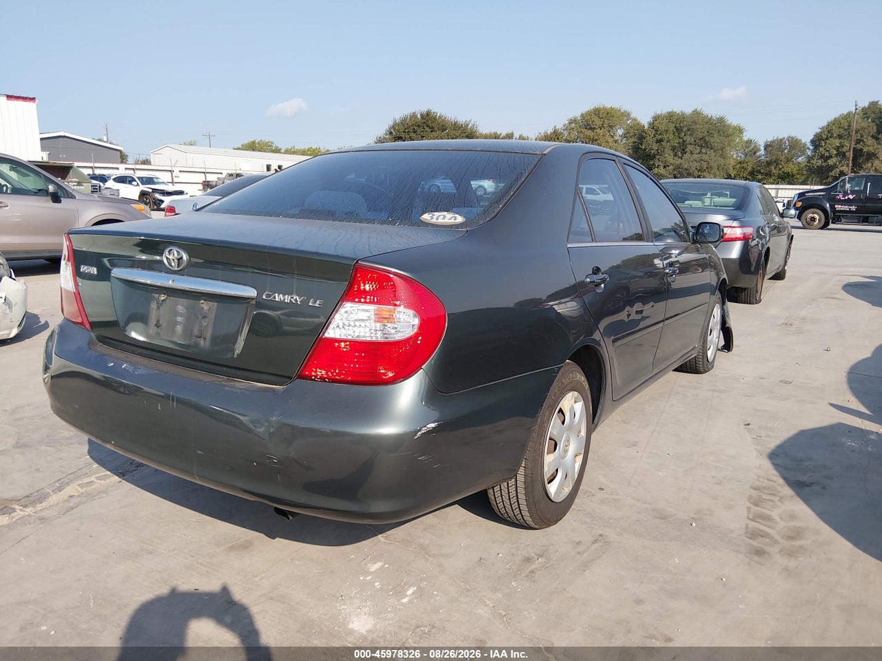 2002 TOYOTA CAMRY LE · 4/11