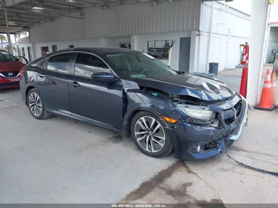2HGFC2F52JH****** · 2018 HONDA CIVIC LX
