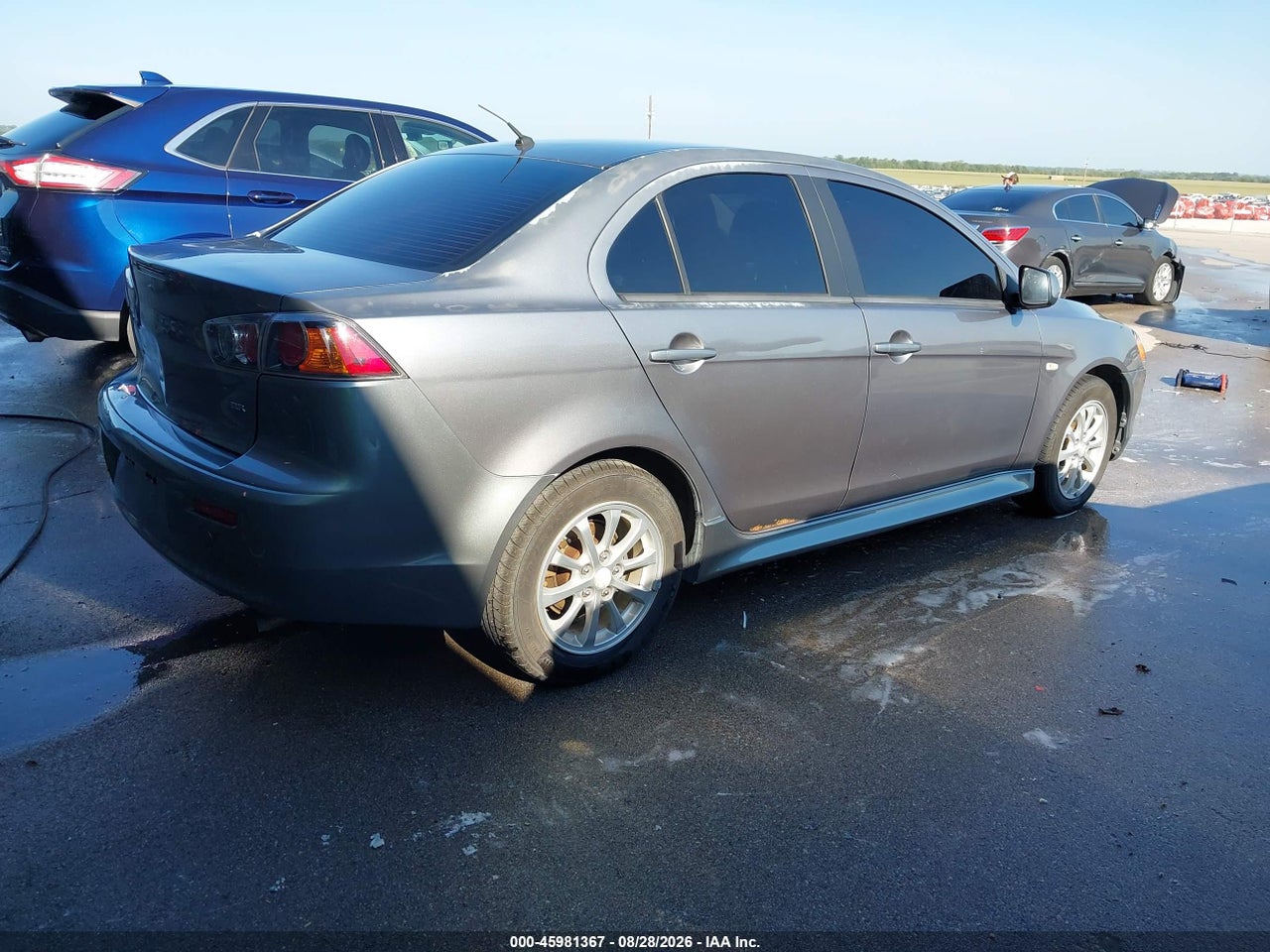 2012 MITSUBISHI LANCER ES · 4/11