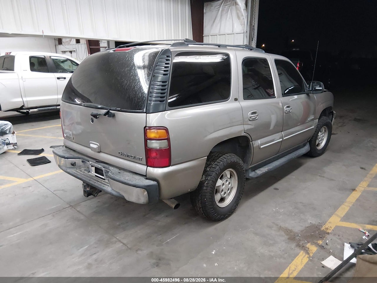 2002 CHEVROLET TAHOE LT · 4/10
