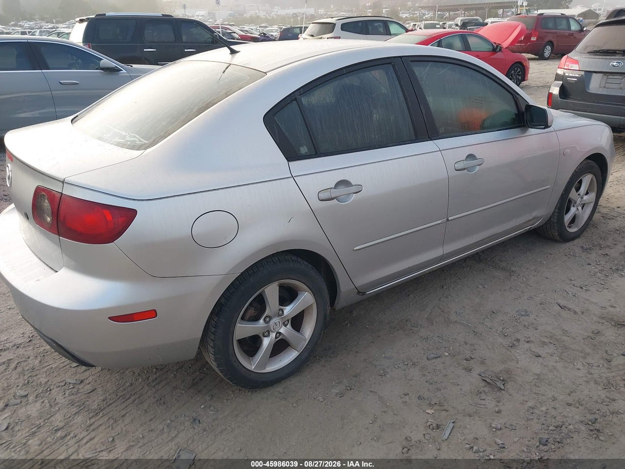 2005 MAZDA MAZDA3 I · 4/11