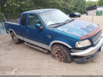 1FTPX18L8YN****** · 2000 FORD F-150 LARIAT/WORK SERIES/XL/XLT