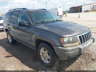 1J4GX48S82C****** · 2002 JEEP GRAND CHEROKEE LAREDO
