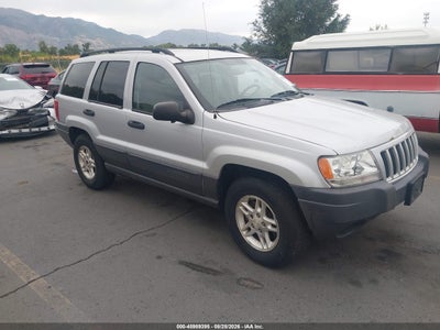 1J4GW48S84C****** · 2004 JEEP GRAND CHEROKEE LAREDO