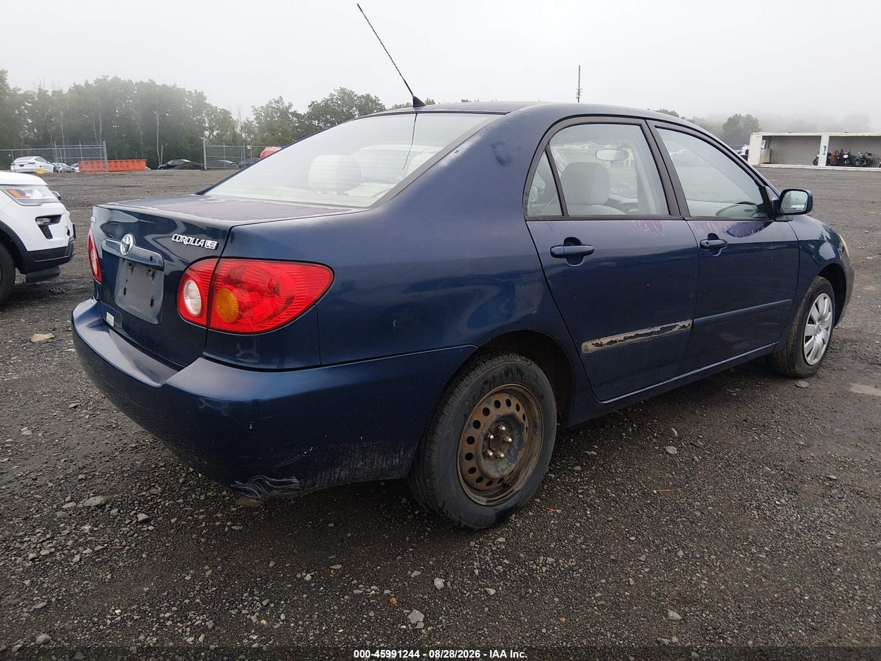 2004 TOYOTA COROLLA LE · 4/11
