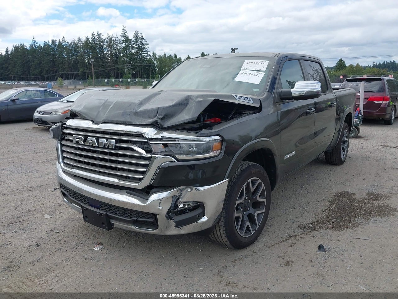2026 RAM 1500 LARAMIE  4X4 5'7 BOX · 2/11